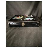 Tammy Fashion Doll with Assorted Vintage Outfits in Black Illustrated Travel Case