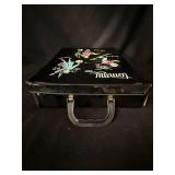 Tammy Fashion Doll with Assorted Vintage Outfits in Black Illustrated Travel Case