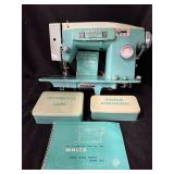 White Brand Teal Zigzag Sewing Machine Model 1563 with Decorative Cams & Zigzag Accessories (Lot of 4)