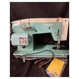 White Brand Teal Zigzag Sewing Machine Model 1563 with Decorative Cams & Zigzag Accessories (Lot of 4)