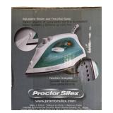 Ironing set including an ironing board and an iron.