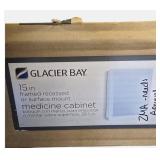 Glacier Bay framed recessed or surface-mounted medicine cabinet.