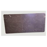 Stylish black table with a sturdy wood-like surface and chic metal legs, measuring 59.5 x 30 inches.