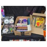 1 Case of Movies 1 Box of Books 1 box of comic Books