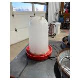 Chicken Waters and Feeders two heated Plugged in and heated up