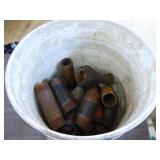 Bucket of Pipe Fittings