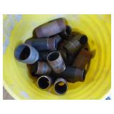 Bucket of Pipe Fittings
