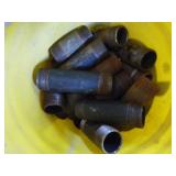 Bucket of Pipe Fittings