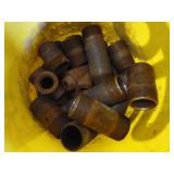 Bucket of Pipe Fittings