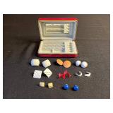 Vintage assorted earrings and jewelry components in red velvet box