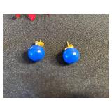 Vintage assorted earrings and jewelry components in red velvet box