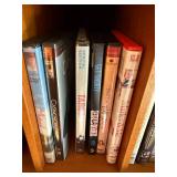 DVD Collection - Assorted Movies & TV Titles on Wooden Shelf