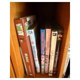 DVD Collection - Assorted Movies & TV Titles on Wooden Shelf