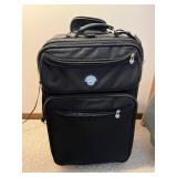 Black Rolling Suitcase with Front Zip Pockets and Star-Pattern Interior