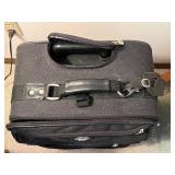 Black Rolling Suitcase with Front Zip Pockets and Star-Pattern Interior
