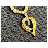 Jewelry Assortment: Faux Pearl Necklace, Heart Pendant, Floral Brooches, Empty Jewelry Bags, Floral Organizer & More