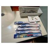 Oral-B Toothbrushes - Assorted Bathroom Accessories in Vanity Drawer