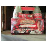 2 Packs of Coca Cola bottles, some ...