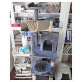 Cats delight scratch, climb, play a...