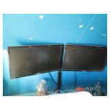 Pair of Samsung monitors with a sta...
