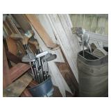 2 Sets of golf clubs, one has wood ...