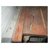 Table saw with tilting blade...