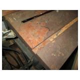 Table saw with tilting blade...