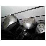 Set of golf clubs in a case...