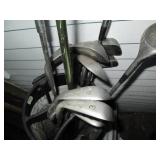 Set of golf clubs in a case...