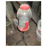 Antique vending machine on a metal ...