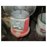 Antique vending machine on a metal ...