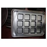 Large tote of heavy duty bakeware a...