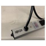 Assorted Power Strips Surge Protectors Extension Cords Basket with Tripp Lite Outlet Bar