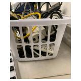 Assorted Power Strips Surge Protectors Extension Cords Basket with Tripp Lite Outlet Bar
