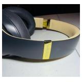 BEATS Wireless Studio3 Noise Cancelling headphones grey & tan in color.