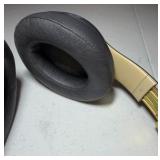 BEATS Wireless Studio3 Noise Cancelling headphones grey & tan in color.