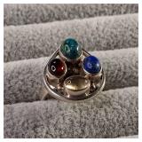 Large teardrop shaped sterling silver ring with four multicolored cabochon stones. size 8.25 - 9.0g