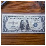 Series 1957A $1 Silver Certificate in circulated condition :: Blue Seal