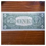 Series 1957A $1 Silver Certificate in circulated condition :: Blue Seal