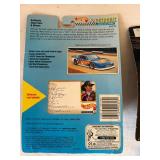 Four 1:64 Scale Diecast Race Cars