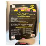 Four 1:64 Scale Diecast Race Cars