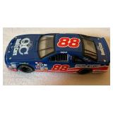 Four 1:64 Scale Diecast Race Cars