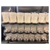 adjustable spring feed bottle organizers