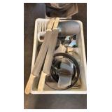 Bucket of various tools scoops