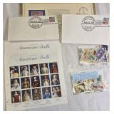 Large lot of stamps, including one bag of unused USA stamps.