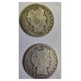 Two Barber half dollars with a face value of one dollar: 1902-P and 1906-P.