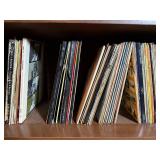 Vinyl Record Collection in Wood Cabinet