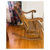 Vintage Wooden Rocking Chair with Carved Back and Upholstered Seat