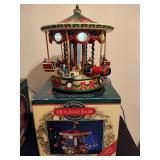 Holiday in Motion Revolving Lodge & Holiday Fair Carousel