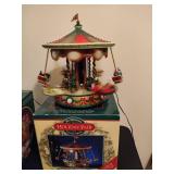 Holiday in Motion Revolving Lodge & Holiday Fair Carousel